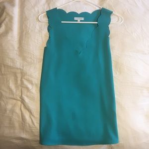 Sleeveless turquoise blouse